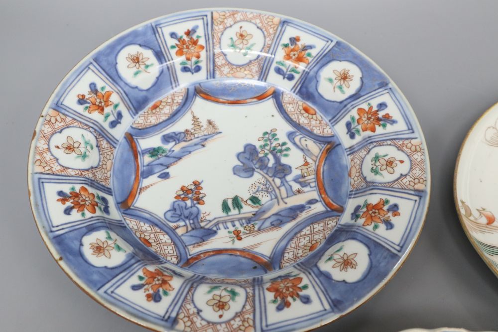 A 17th century Arita crane dish and an 18th century Chinese Imari fluted dish and similar soup plate, largest diameter 26cm
